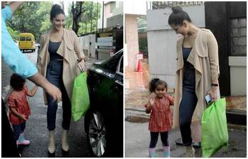 বৃষ্টির মাঝেই মেয়ে নিশার সঙ্গে ক্যামেরাবন্দি সানি