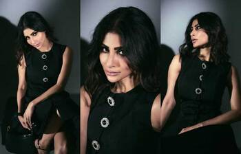 কালো পোশাক আর খোলা চুলে লাস্যময়ী মৌনি