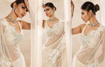 সাদা শাড়িতে আবেদন ছড়াচ্ছেন মৌনি