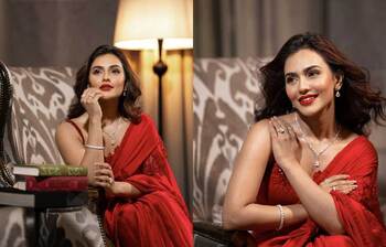 লাল শাড়িতে লাস্যময়ী নুসরাত