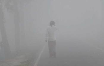 কুয়াশায় ঢাকা বিস্তীর্ণ জনপদ