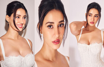 সাদা লেসের বডিকনে লাস্যময়ী দিশা