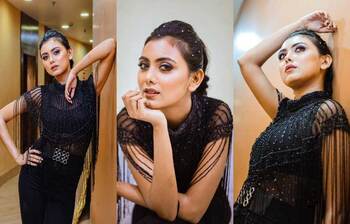 কালো পোশাকে লাস্যময়ী ইধিকা