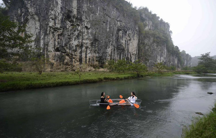 নৌভ্রমণে বের হয়ে দুই বান্ধবী গল্পে মশগুল হয়ে আছেন।