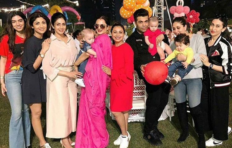 আদিরার জন্মদিনের ছবি ফ্রেমবন্দি করেছেন সাংবাদিকরা। রেখার কোলে খেলায় মগ্ন করণ জোহরের ছেলে যশ।