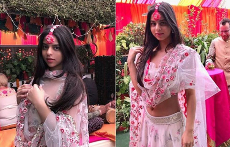 জানাগেছে, বলিউডের অন্য তারকাদের সন্তানদের সঙ্গে পাল্লা দিতে ফুল দিয়ে সেজেছেন সুহানা।