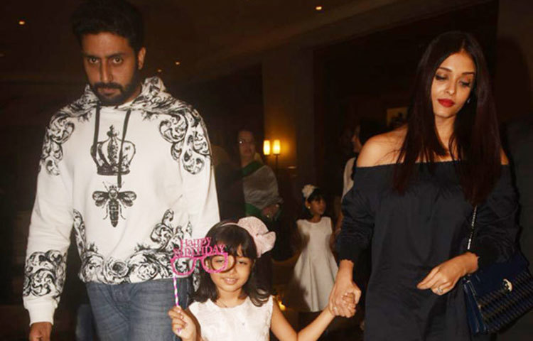 ঐশ্বরিয়ার এবং অভিষেকের সঙ্গে তাদের মেয়ে আরাধ্যা।