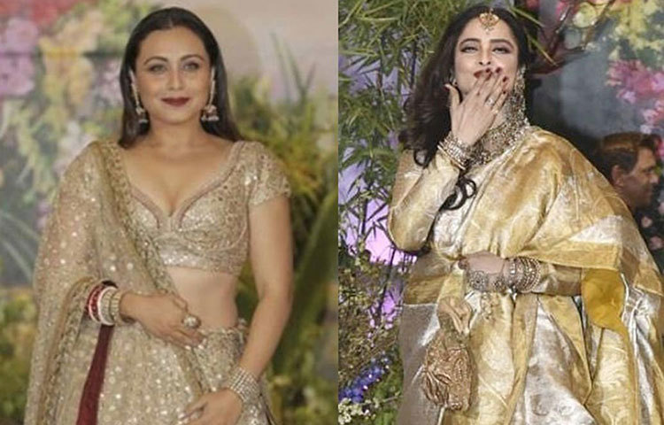 সোনালি রঙা ট্রাডিশনাল লেহেঙ্গা ও ঝুমকায় নজর কেড়ে ছিলেন রানি মুখার্জী । রেখার পরনেও ছিল সাবেকী সাজ। ভারী গয়না ও খোলা চুলে রেখাকে লাগছিল অনবদ্য।