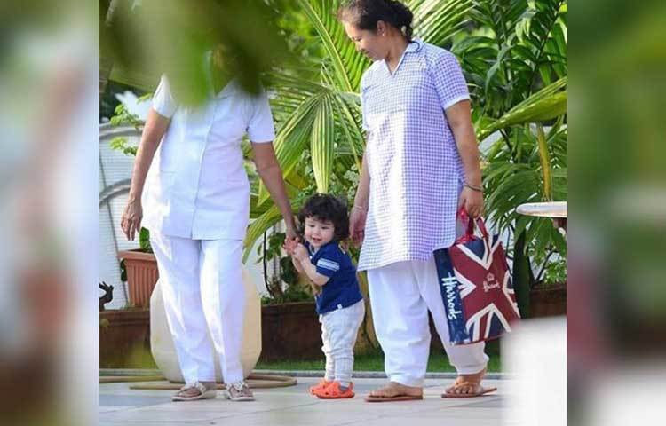 সুইমিং পুলের পাশে তৈমুর।