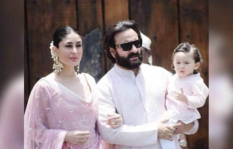 বাবা ও মায়ের সঙ্গে ছোট্ট তৈমুর।