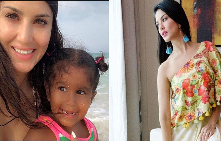 এক কন্যাকে নিয়ে হাস্যোজ্জ্বল সানি।