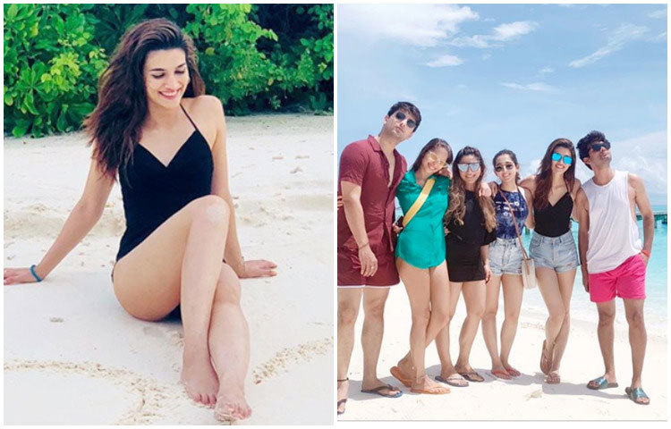 আনন্দ হাসিতে কৃতি।