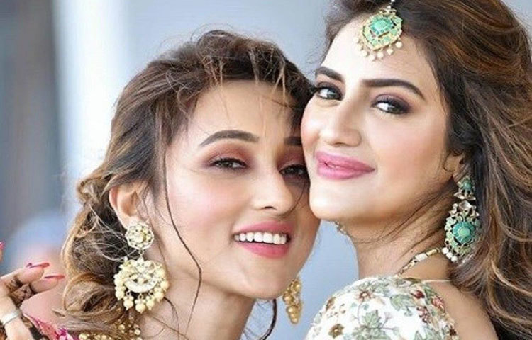 ১৯ জুন শুরু হয়েছিল নুসরাত-নিখিলের বিবাহিত জীবনের ইনিংস। এত জাঁকজমক, এত আয়োজন টালিউডে আর কোনো বিয়েতে কার্যত দেখা যায়নি। মেহেন্দি, সঙ্গীত, ইয়ট পার্টি, হোয়াইট ওয়েডিং— কী ছিল না সেখানে! টলি ইন্ডাস্ট্রি থেকে কারও নিমন্ত্রণ না থাকলেও নুসরাতের অন্তরঙ্গ বন্ধু অভিনেত্রী মিমি চক্রবর্তী কিন্তু প্রথম দিন থেকেই তার সর্বক্ষণের সঙ্গী!