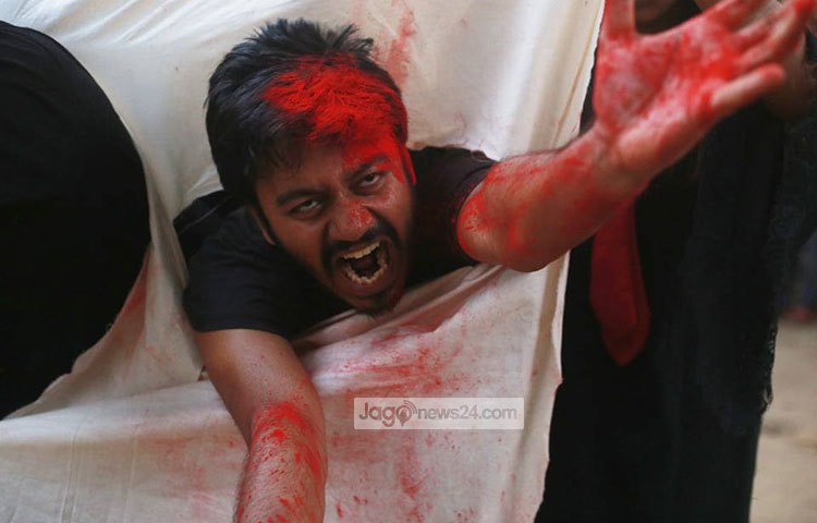 গণহত্যার প্রতীকী আয়োজন। ছবি: মাহবুব আলম
