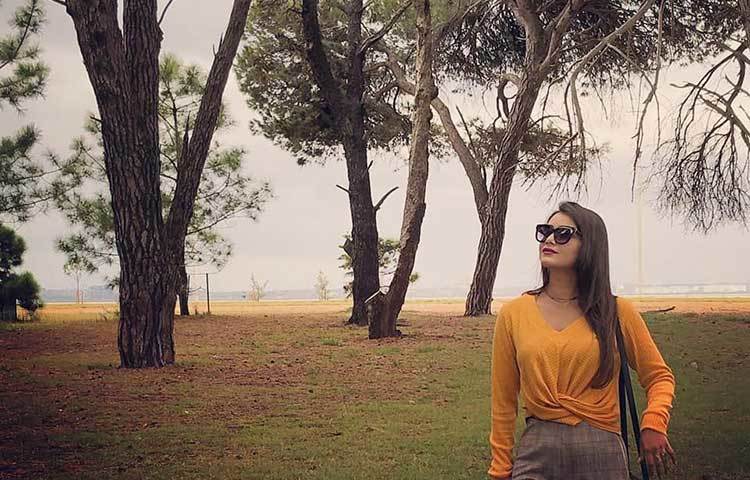 হলুদ সাজে প্রকৃতির মাঝে তিশা।