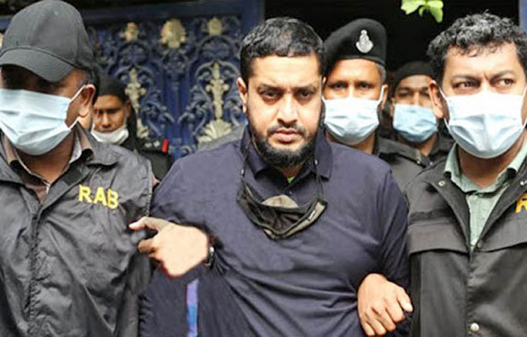 অর্থপাচার প্রতিরোধ আইনের মামলায় গাড়ি এবং স্বর্ণ ব্যবসায়ী মনির হোসেন ওরফে গোল্ডেন মনিরের তিন দিনের রিমান্ড মঞ্জুর করেছেন আদালত। ছবি: সংগৃহীত