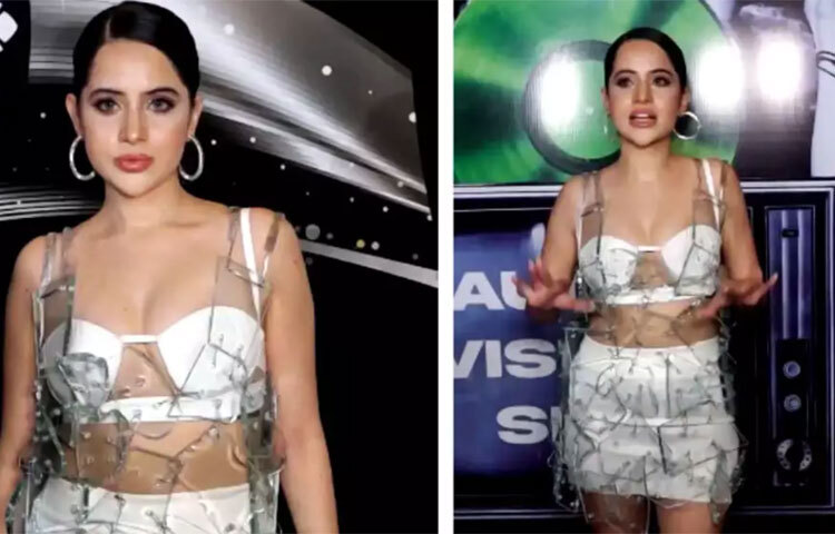 পোশাক-আশাক নিয়ে বরাবরই পরীক্ষা-নিরীক্ষা করতে ভালবাসেন উরফি জাভেদ। এই নিয়ে প্রায়ই বিতর্কে থাকেন তিনি। পরনে কখনও অবিকল কাঁচের মতো দেখতে কাপড় দিয়ে তৈরি মিনি ড্রেস, আবার কখনও নিজের পুরনো জামা কেটেকুটে সেলাই করে পরেন উরফি। ছবি: সংগৃহীত