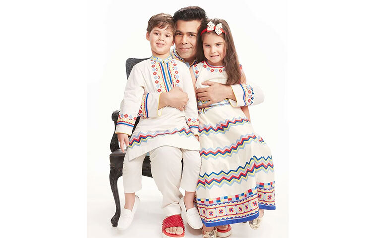 রুহি আর যশ। নিজের বৃদ্ধা মা এবং তার একার জীবনে দুই শিশুকে নিয়ে এসেছেন করণ জোহর। সেই সারোগেসির মাধ্যমে এখন তিনি এবং তার মা মিলে যমজ সন্তানের লালন পালন করেন। ছবি: সংগৃহীত