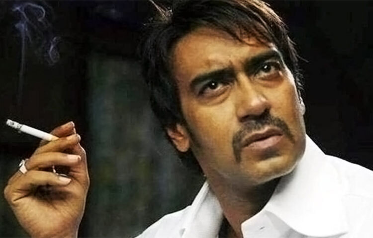 নিজেই জানেন ধূমপান স্বাস্থ্যের জন্যে ক্ষতিকারক। কিন্তু নিজেই বলেন, ‘আমৃত্যু সিগারেট আমার সঙ্গী। এ ছাড়া আমি বাঁচব না।’ অজয় দেবগণ। নিজেই জানিয়েছেন, ধূমপান করা কোনো গর্বের বিষয় নয়। তার মেয়েও তাকে এই নেশা ছাড়াতে সাহায্য করেন। কিন্তু তাতে কিছুই হয়নি। ছবি: সংগৃহীত