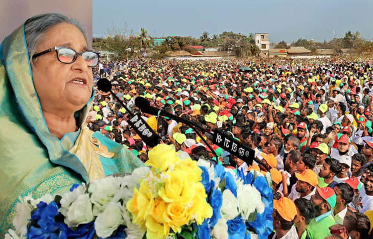 দ্বাদশ জাতীয় নির্বাচন সামনে রেখে আরও একবার নৌকায় ভোট চেয়ে হাওরের মানুষের ওয়াদা নিলেন প্রধানমন্ত্রী ও আওয়ামী লীগ সভাপতি শেখ হাসিনা। আজ কিশোরগঞ্জের মিঠামইন সদরের হেলিপ্যাড মাঠে আওয়ামী লীগ আয়োজিত জনসভায় প্রধান অতিথির ভাষণে তিনি সবার ভোট প্রার্থনা করেন। ছবি: ইয়াসিন কবির জয়