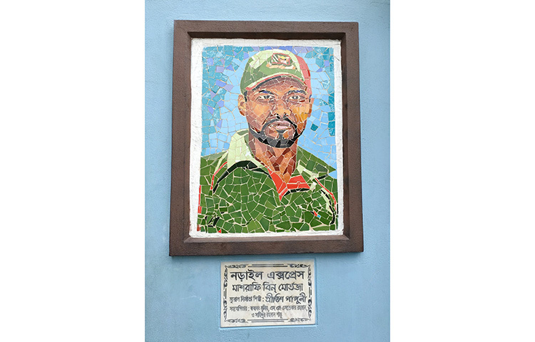বাড়ির দেয়ালে মাশরাফির প্রতিকৃতি। ছবি: আরেফিন রোহান নিয়াজ