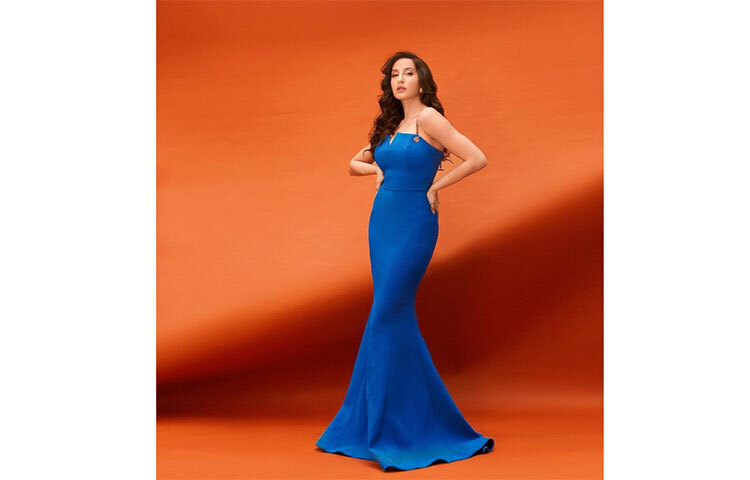 নীল বডিকন ড্রেসে ভাইরাল হয়েছে নোরার ছবি। ছবি: সংগৃহীত