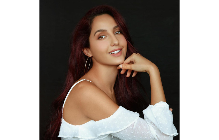 নোরা ফাতেহির মাতৃভাষা ইংরেজি হলেও তিনি আরবি, হিন্দি, ও ফরাসি ভাষায় কথা বলতে পারেন। ছবি: ফেসবুক