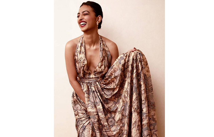 উচ্ছ্ব ল হাসিতে রাধিকা।