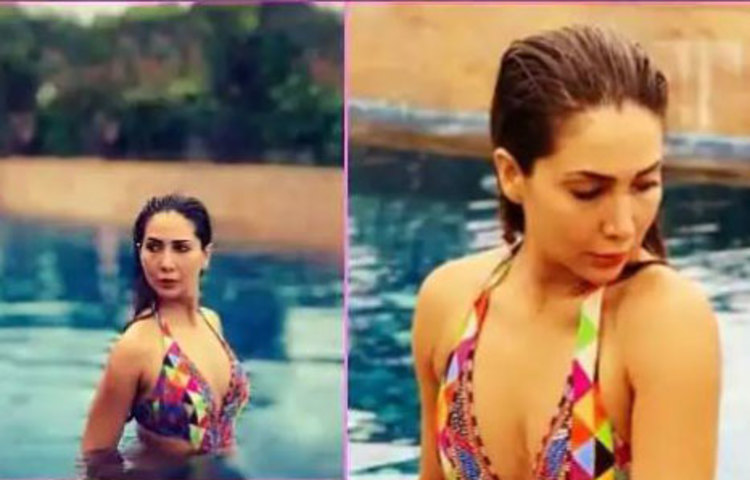 সোশ্যাল মিডিয়াতে পুলে গোসলের ছবি পোস্ট করেছেন অভিনেত্রী কিম শর্মা।