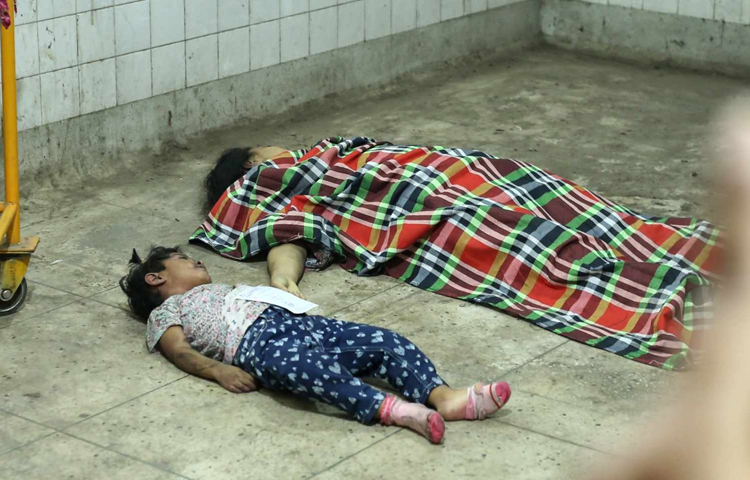 মর্গে ছোট্ট শিশুর নিথর লাশ। ছবি: মাহবুব আলম