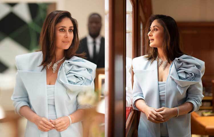 ফুলেল ডিটেইলিং দেওয়া পাউডার ব্লু জ্যাকেটের সঙ্গে হীরার নেকপিসে বেশ মানিয়েছে তাকে।