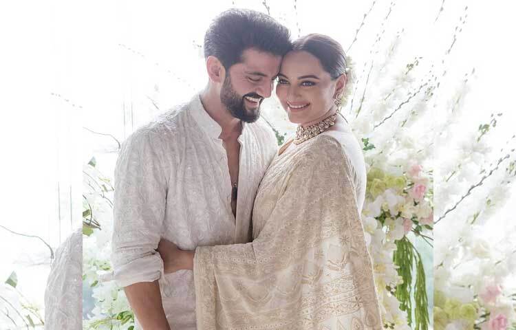 বিশেষ দিনের জন্য সাদা রং বেছে নিয়েছেন সোনাক্ষী। খোঁপায় গুঁজেছেন ফুল। সোনাক্ষীর সঙ্গে মিলিয়ে জহির সাদা রঙের পোশাক বেছে নিয়েছেন। ছবি: সোনাক্ষীর ফেসবুক থেকে