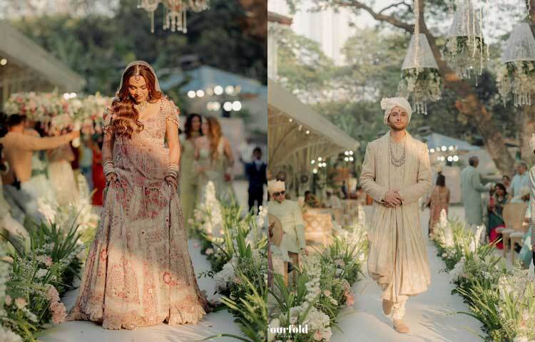 বিয়ের দিন আলিয়ার পরনে ছিল অফ হোয়াইট, প্যাস্টেল ও গোলাপি রঙের ভারী কাজের লেহেঙ্গা। অন্যদিকে শেনের পরনে ছিল অফ হোয়াইট শেরওয়ানি।