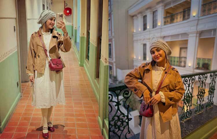 সাদা জামার সঙ্গে বেইজ রঙের ক্রপ ফ্রেঞ্চ কোটের সঙ্গে অভিনেত্রী বেছে নিয়েছেন উলের স্টাইলিশ টুপি।