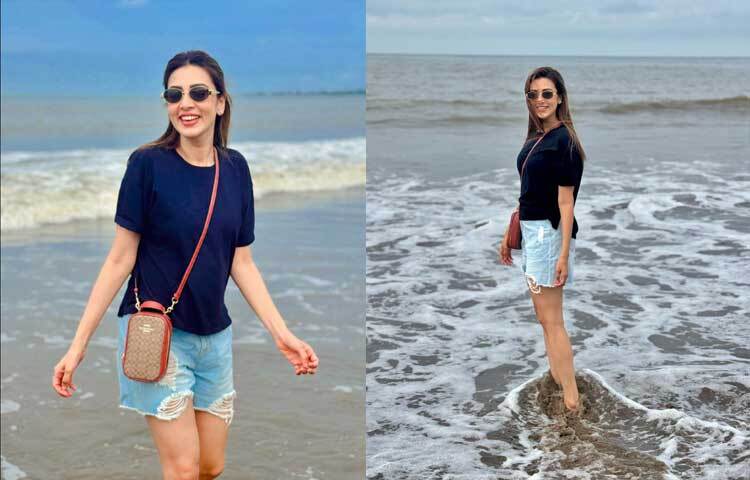 সমুদ্র বিলাসে গিয়ে নীল টি-শার্ট, শর্ট আর স্নানগ্লাসে ক্যামেরাবন্দী হয়েছেন মিম।