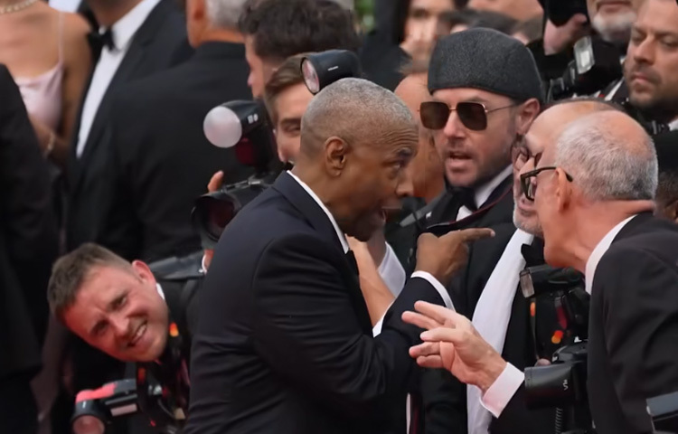 প্রিমিয়ার অনুষ্ঠানে লালগালিচায় ফটোগ্রাফাররা ছবি তোলার জন্য বিভিন্ন রকম তৎপরতা চালাচ্ছিলেন। অনেক সময় তারা অভিনেতা-অভিনেত্রীদের দৃষ্টি আকর্ষণ করতে উচ্চস্বরে চিৎকার করতেন। সেই সময় এক ফটোগ্রাফারের অতিরিক্ত চিৎকারে উত্তেজিত হয়ে ডেনজেল পাল্টা চিৎকার করে তাকে থামার নির্দেশ দেন।