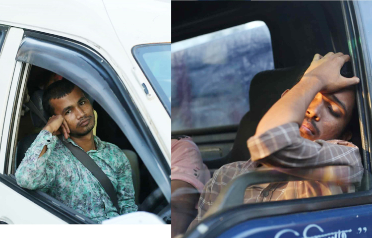 অসহায় চালকরা কেউ কেউ ঘুমিয়ে পড়েন অপেক্ষা করতে করতে। আবার কেউ কেউ অসহায় দৃষ্টি নিয়ে তাকিয়ে থাকেন সামনের দিকে। ছবি: মাহবুব আলম