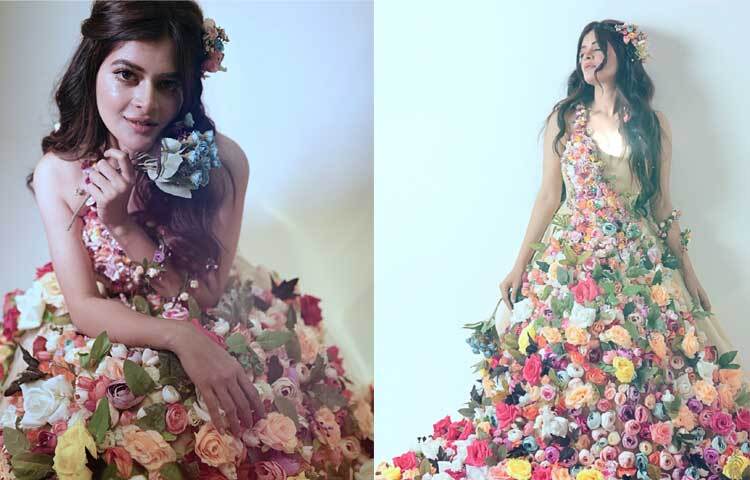 নানা পোজের ছবিগুলোর ক্যাপশনে অভিনেত্রী লিখেছেন, ‘আরে বলো যেখানে তুমি রোপিত সেখানেই ফুল ফোটো, আমি বলি যেখানে তুমি ভালো সেখানেই ফুল ফোটো।আমি শুধু ফুল পরিনি, আমি এটি ডিজাইন করেছি। এটি কেবল একটি পোশাক নয়, এটি একটি ঘোষণা। আমরা কোমল এবং উগ্র, মার্জিত এবং অপ্রতিরোধ্য হতে পারি। তাই এখানে জোরে ফুল ফোটানো, গর্বিতভাবে ফুল ফোটানো এবং ঘোষণা করা হল ‘ফুল ফুটুক নাই বা ফুটুক, আজ বসন্ত’।