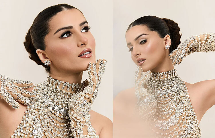 চুল বাধা হয়েছে স্মার্ট স্লিক-বেনে, যেখানে আধুনিকতার ছোঁয়া মিলেছে নস্টালজিক এলিগ্যান্সে।