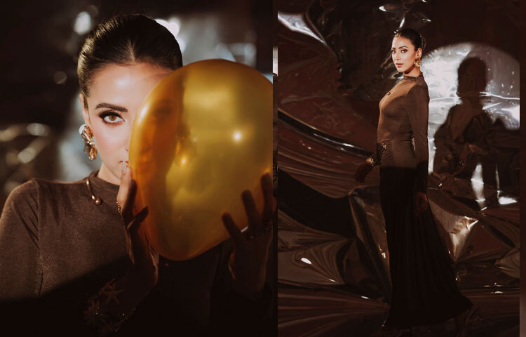 শীতের সাজে ভারী বা ঝকঝকে স্বর্ণের টোন দারুণ মানিয়ে যায়। মিমের লুকে এটি আরও স্পষ্ট।