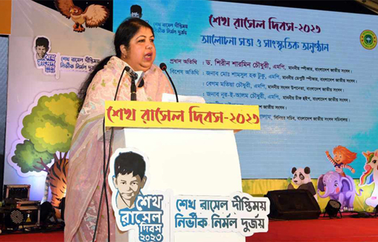 বাংলাদেশের প্রতিটি শিশুকে শেখ রাসেলের চেতনায় গড়ে তুলতে হবে বলে মন্তব্য করেছেন জাতীয় সংসদের স্পিকার ড. শিরীন শারমিন চৌধুরী। আজ রাসেল দিবস ২০২৩ উপলক্ষে জাতীয় সংসদ সচিবালয়ের উদ্যোগে পার্লামেন্ট মেম্বার্স ক্লাব প্রাঙ্গণে আয়োজিত আলোচনা সভা ও সাংস্কৃতিক অনুষ্ঠানে প্রধান অতিথির বক্তব্যে তিনি এ মন্তব্য করেন। ছবি: জাগো নিউজ