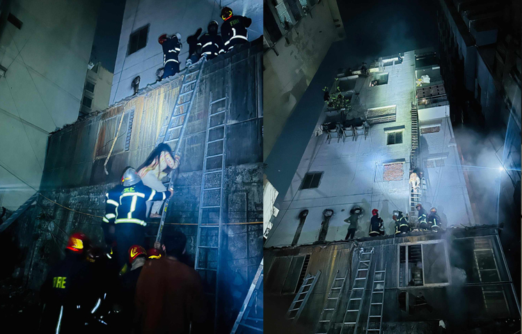 আগুনে ভবনে আটকে পড়া ব্যক্তিদের নামিয়ে আনার চেষ্টায় ফায়ার সার্ভিসের কর্মীরা। ছবি: তৌহিদুজ্জামান তন্ময়