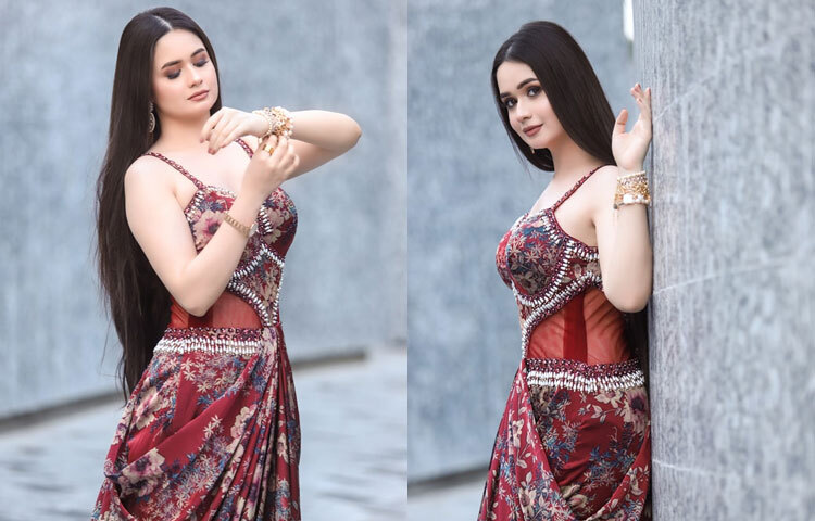 মেরুন স্লিভলেস ড্রেসে আবেদন ছড়াচ্ছেন এই অভিনেত্রী।