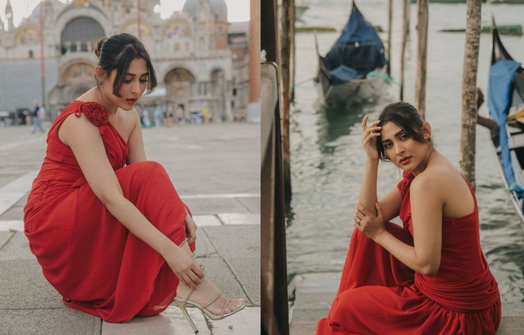 পোশাকজুড়ে রুসড ও গ্যাদার্ড স্টাইলের কারুকাজ, শোল্ডারে রোমান্টিক লাল ফুলের ছোঁয়া-সব মিলিয়ে এক নিখুঁত রোমান্টিক লুক।