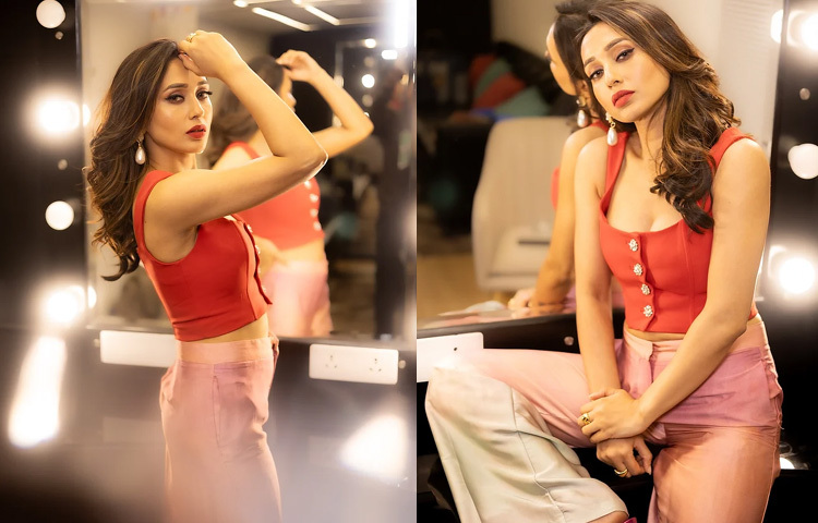 সাদা স্টোন বসানো লাল ডিপনেক ক্রপটপের সঙ্গে ডুয়েল টোনের হাইওয়েস্ট প্যান্টে লাস্যময়ী মিমি।