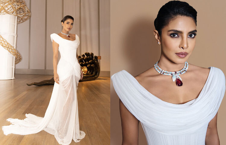 বরাবরের মতো গ্ল্যামারের প্রতীক প্রিয়াঙ্কা হাজির হয়েছিলেন সাদা শিয়ার ফ্যাব্রিকের ফিটেড গাউনে।