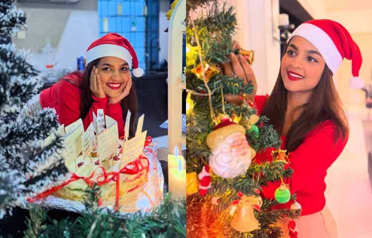 ক্রিসমাসের পুরো উৎসবমুখর আমেজে উজ্জ্বল লাল ক্রপ-টপ সোয়েটার এবং সান্টা টুপি পরে ফ্রেমবন্দি হয়েছেন সাদিয়া আয়মান।