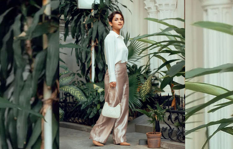 সাদিয়া বেছে নিয়েছেন সাদা শার্টের সঙ্গে রোজ গোল্ড রঙের হাইওয়েস্ট প্যান্ট। ন্যুড শু, সাদা ক্রসবডি ব্যাগ এবং মেটালিক হুপ দুল তার এই লুককে দিয়েছে এলিগ্যান্ট টাচ।