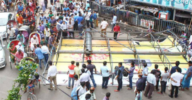 Billboard lands on street, one injured