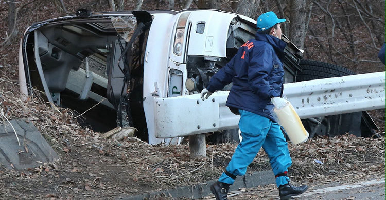 Japan tour bus veers off mountain road: 14 killed